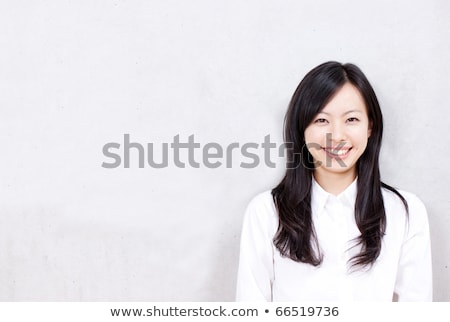 Stock photo: Young Girl Introducing Something