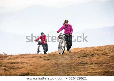 [[stock_photo]]: Bikers Riding On A Country Road