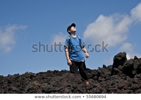 Сток-фото: Boy Walking In Volcanic Area