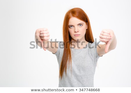 Сток-фото: Young Woman Showing Thumbs Down Sign With Both Hands