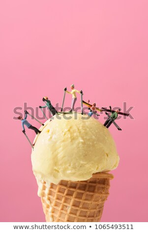 Stok fotoğraf: Miniature Skiers On An Ice Cream