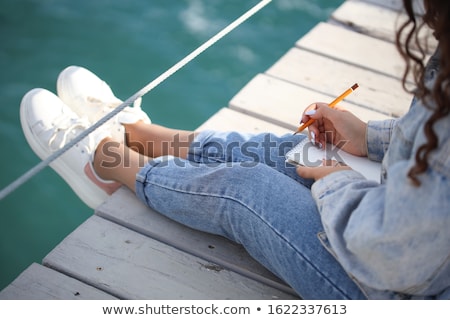 Stock fotó: Girl Sitting In The Pier