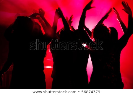People Dancing In Disco Lightshow Stockfoto © Kzenon