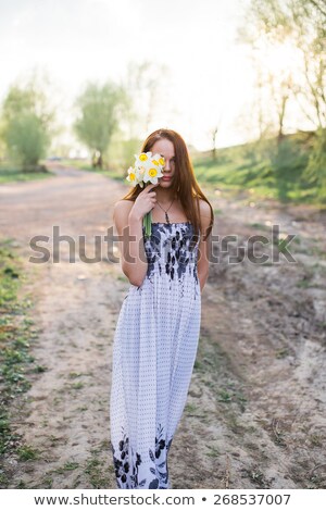 [[stock_photo]]: Brunette Lady Realxing In The Orchard