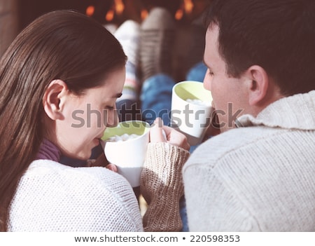 Сток-фото: Close Up Of Couple Drinking Hot Chocolate At Home