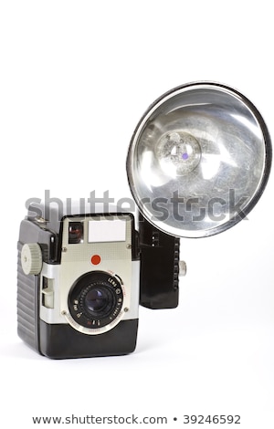 Foto d'archivio: A Vintage Camera With Retro Revival And Lens Cap