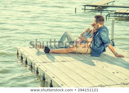 Stock fotó: Romantic Beautiful Couple In Love Embracing At The Pier