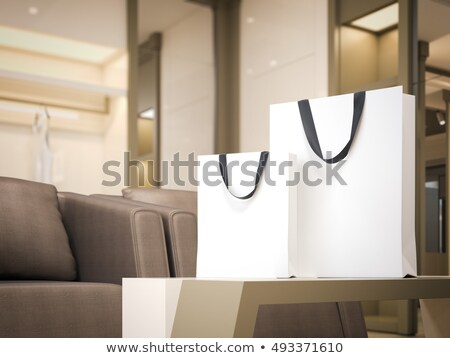 Foto stock: Two White Shopping Bags In Bright Boutique 3d Rendering