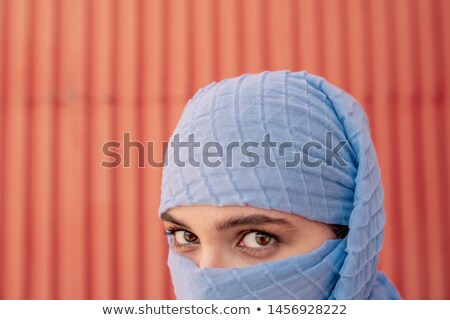 Stockfoto: Eyes And Eyebrows Of Pretty Young Arabian Woman In Blue Hijab