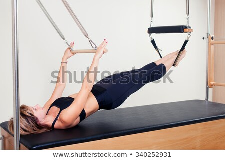 [[stock_photo]]: Aerobics Pilates Instructor Woman In Cadillac