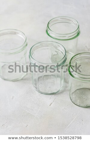 Stok fotoğraf: Four Glass Jars