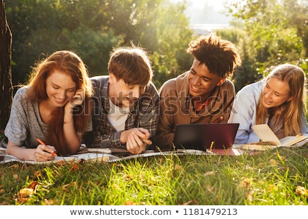 Foto stock: Group Of Smiling Multhiethnic Students