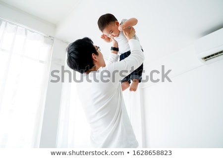 Foto stock: Dad Playing With His Son
