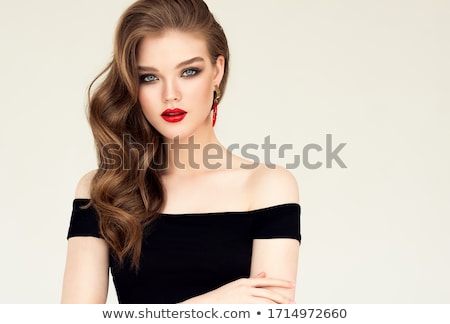 Foto d'archivio: Beautiful Woman With Hair Styling And Evening Make Up Jewelry A