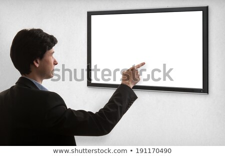 Foto d'archivio: Businessman Pointing To Plasma Panel