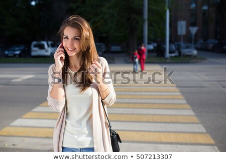 Foto stock: Pretty Blonde Woman Calling On The Phone