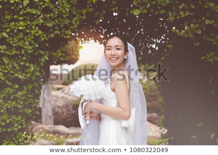 Stock photo: Young Pretty Smiling Asian Korean Girl Wearing Modern Fashion Clothers On Pink Background Lifestyle