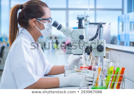 Stockfoto: Scientist Woman With Blood Test Tube