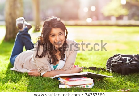 Stock fotó: Shot Of A Woman College Student Studying On Campus