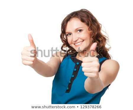 Foto stock: Portrait Of A Smiling Woman While Giving Two Thumbs Up