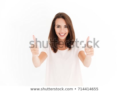 Foto stock: Young Woman Showing Thumbs Up