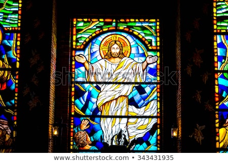 Stok fotoğraf: Stained Glass Showing Jesus Resurrection