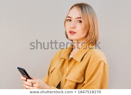 Foto stock: Elegant Blonde Lady Looking At Camera