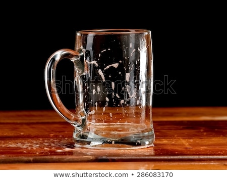 Stok fotoğraf: Empty Beer Mug On A White Background