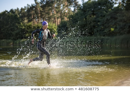 Foto stock: Girl In The Swimrun Suit Outdoors