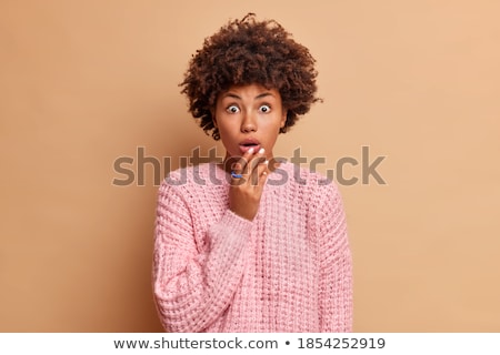 Stock fotó: Young Amazing Woman Posing Over Dark Background