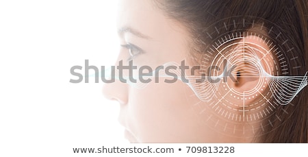 Stok fotoğraf: Womans Ear With Hearing Aid