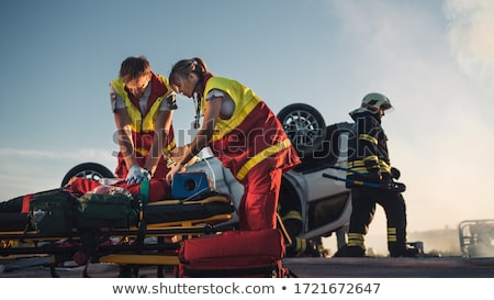 Stock photo: Paramedic Performing Resuscitation On Patient
