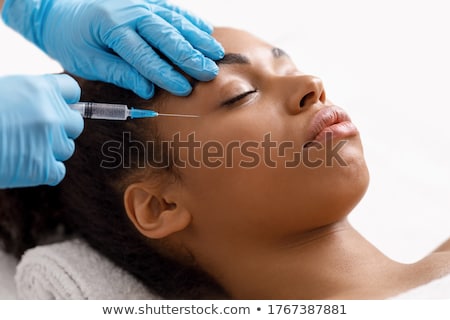 Stock photo: Woman Is Getting Injection In Head Mesotherapy