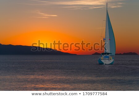 Foto stock: Sunset At Mediterranean Sea With Orange Sky