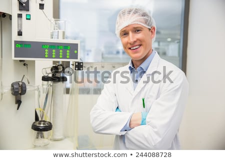 Stock fotó: Pharmacist Using Machinery To Make Medicine