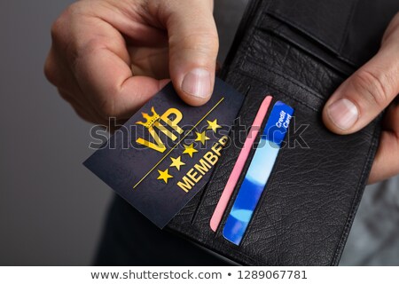 Zdjęcia stock: Man Removing Vip Member Card From Wallet