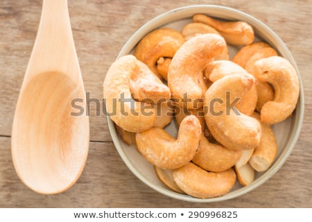 Cashew Nut Roast Salt On Weathered Wooden Table Stock foto © nalinratphi