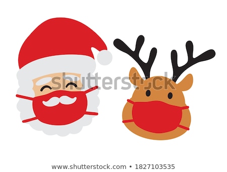 Foto d'archivio: Cartoon Christmas Reindeer Wearing Santa Hat