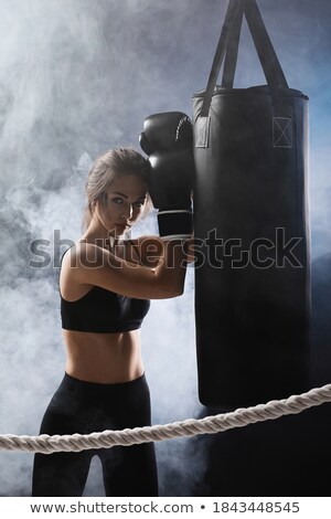 Сток-фото: Boxer Leaning On Boxing Ring