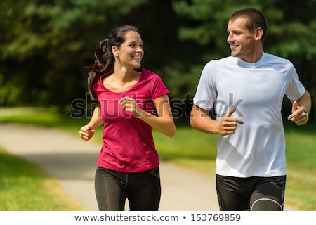 Stock photo: Smiling Couple Running