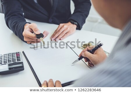 Salesman Send Key To Customer After Man Signing Car Document Con Zdjęcia stock © Freedomz