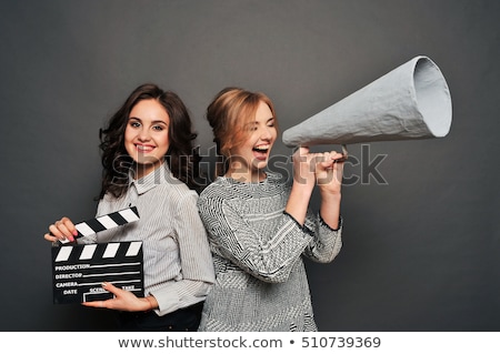 Stockfoto: Two Women Inform About The Beginning Of Shooting