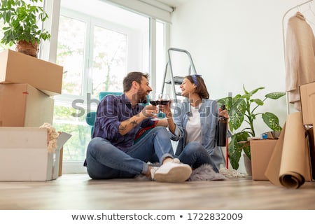 [[stock_photo]]: Couple Celebrating New Home