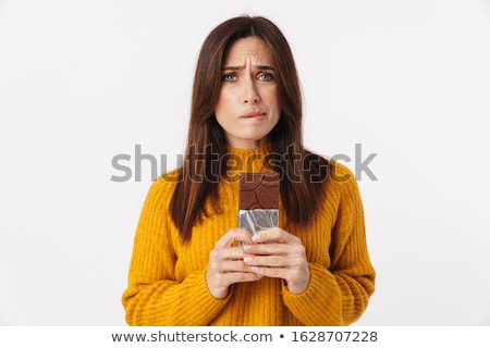 Stockfoto: Woman With A Chocolate Bar