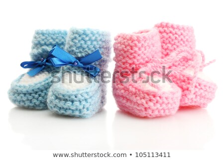 Stok fotoğraf: Two Pairs Of Baby Blue And Pink Boots