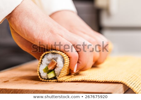 Stock photo: Cook Turns Nori Sheet