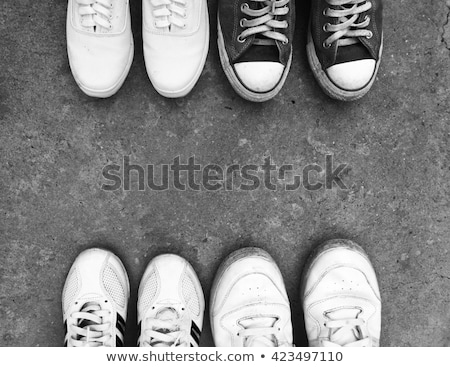 Stok fotoğraf: Old Black And White Sneakers