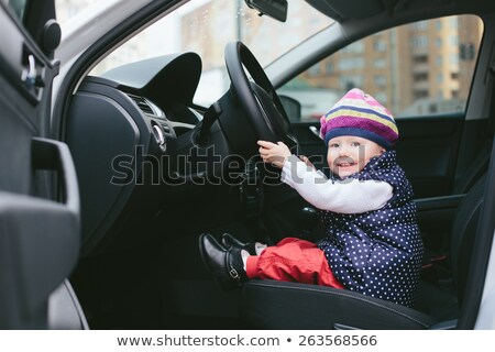 Foto d'archivio: Happy Family With Little Child Driving In Car