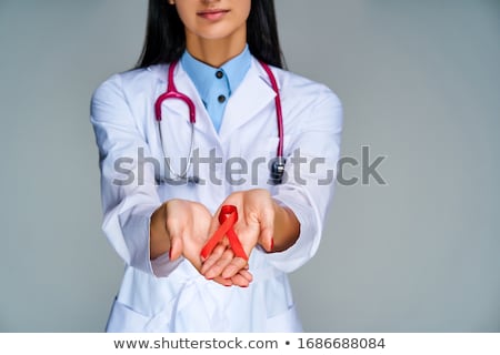 Stock photo: Red Ribbon For The Fight Against Aids