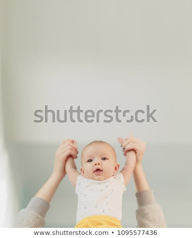 Сток-фото: Mother Breastfeeding Her Little Baby Boy In Arms